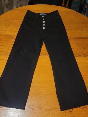 High-Rise Black Wide-Leg Jeans with Exposed Button Fly